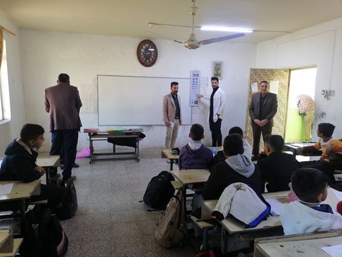 إجراء فحص بصر لطلاب مدرسة الحجاز الابتدائية في قضاء المحاويل تحقيقاً لأهداف التنمية المستدامة  