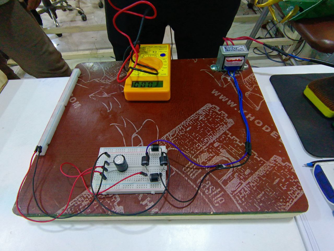 Design and implementation of circuits for converting alternating current to direct current.